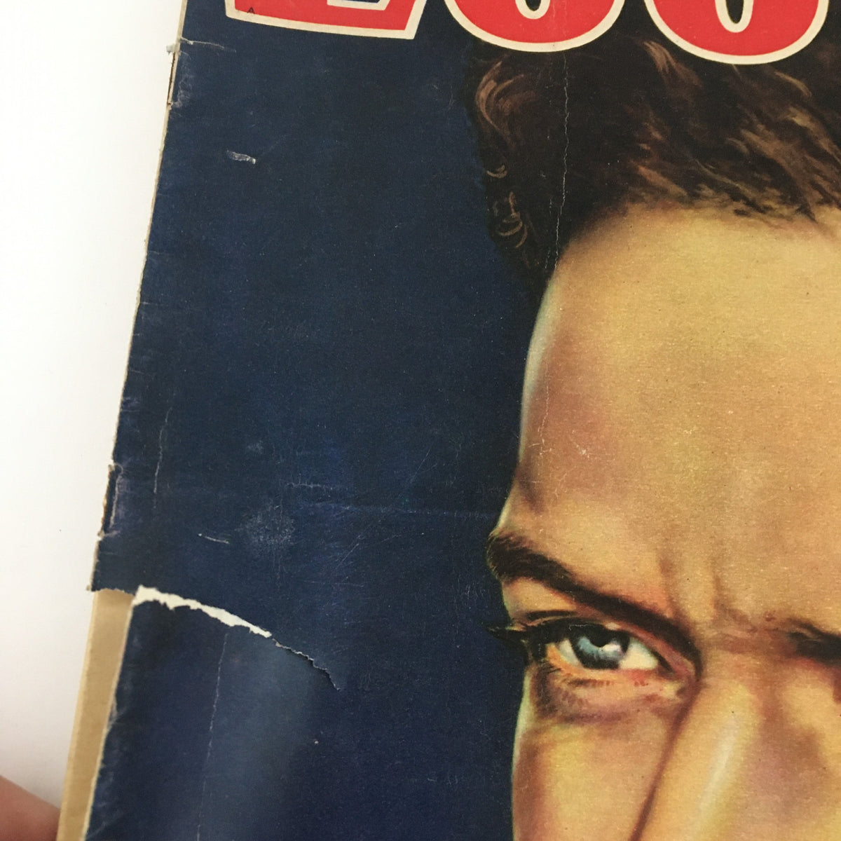 Zoomed-in view of the Look Magazine April 11 1939 cover, focusing on the phrase 'Look' and the eye detail of Charles Lindbergh.