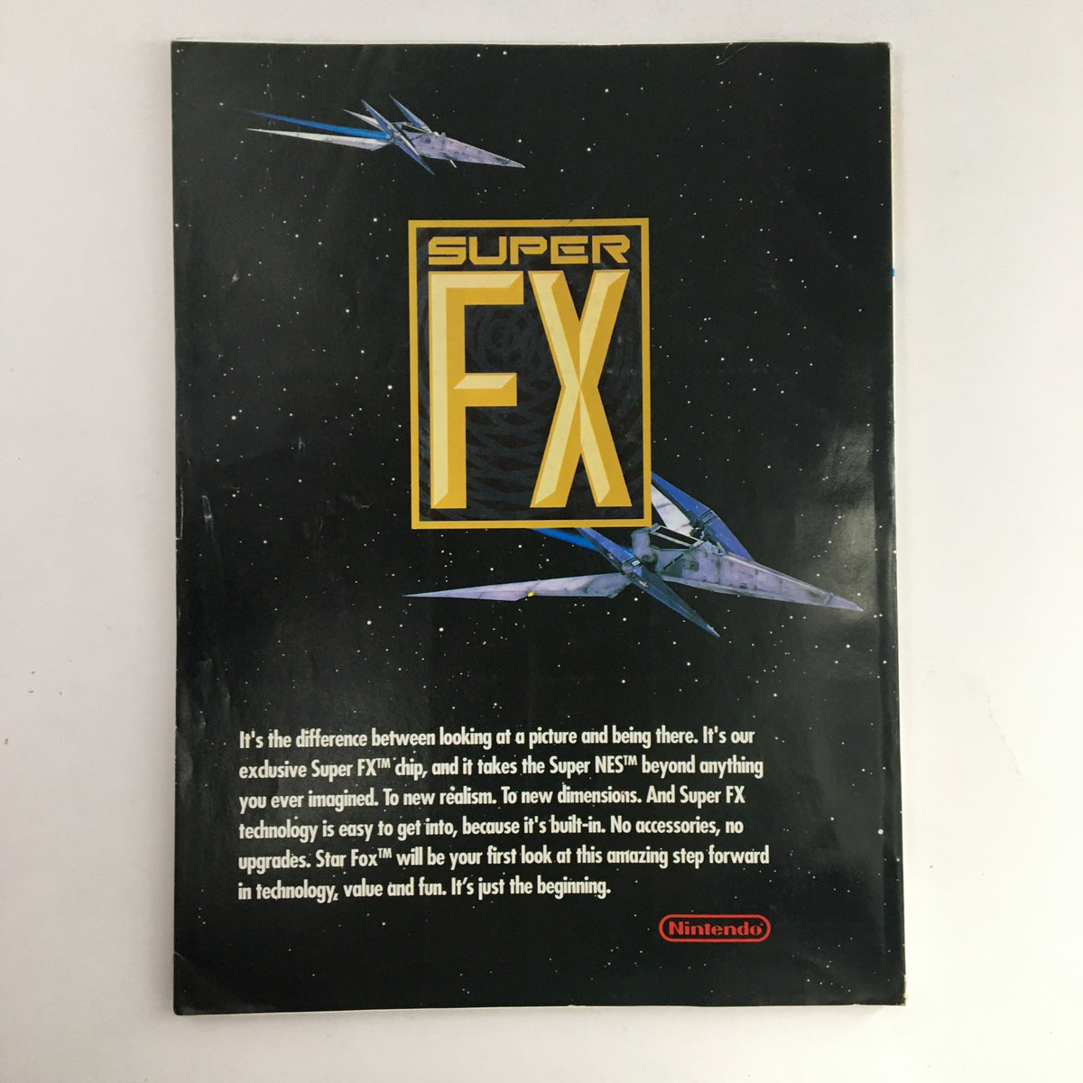Back cover of Nintendo promotional material showcasing the Super FX chip, with a sleek design and spaceships in a starry background. Relates to the Nintendo Power Magazine May 1993 Vol 48 issue featuring Batman Returns.