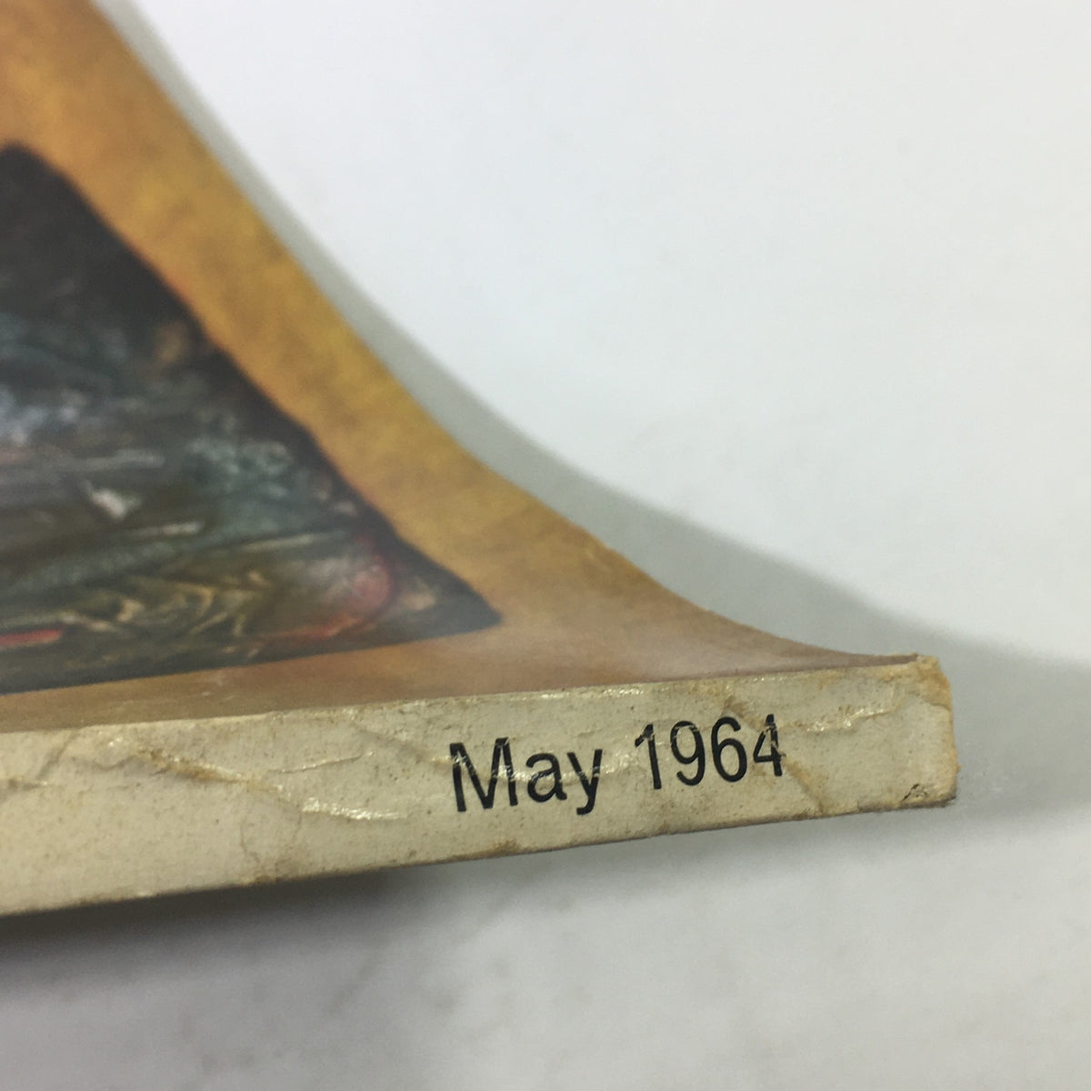 Bottom edge of VTG The Connoisseur Magazine, May 1964, highlighting the publication date.