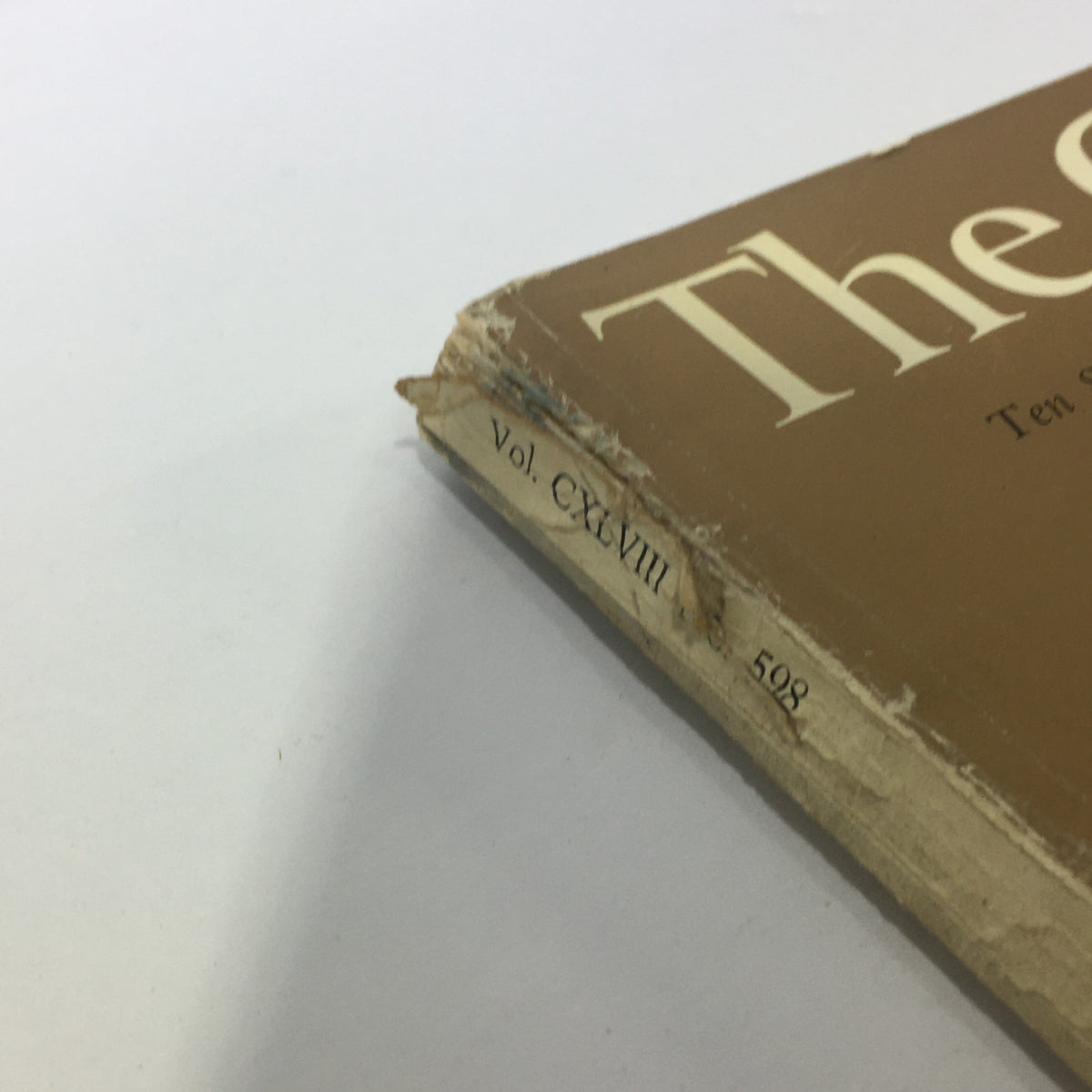 Spine of The Connoisseur Magazine, December 1961, displaying Volume CXLVIII, No. 598 with signs of wear, highlighting its vintage character.