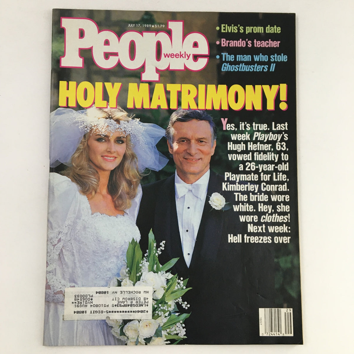 Cover of People Weekly Magazine from July 17, 1989, featuring Hugh Hefner and Playmate Kimberley Conrad in wedding attire, highlighting their marriage. The headline reads 'HOLY MATRIMONY!' with a floral design and additional articles listed.