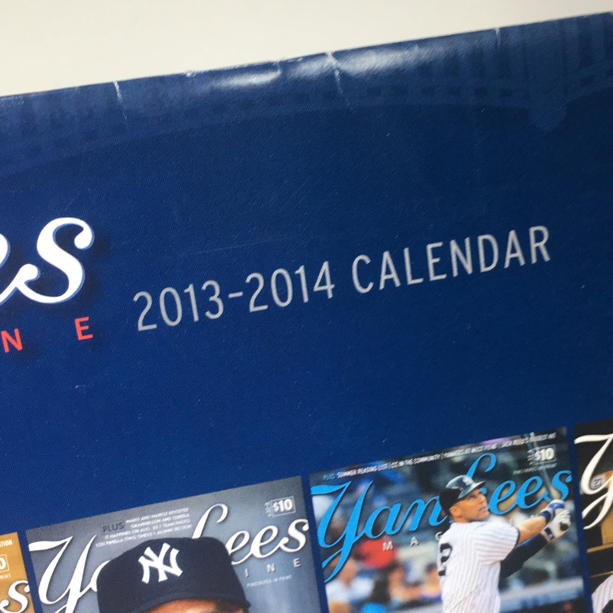 VTG 2013-2014 Yankees Magazine Calendar cover featuring iconic Yankees branding.