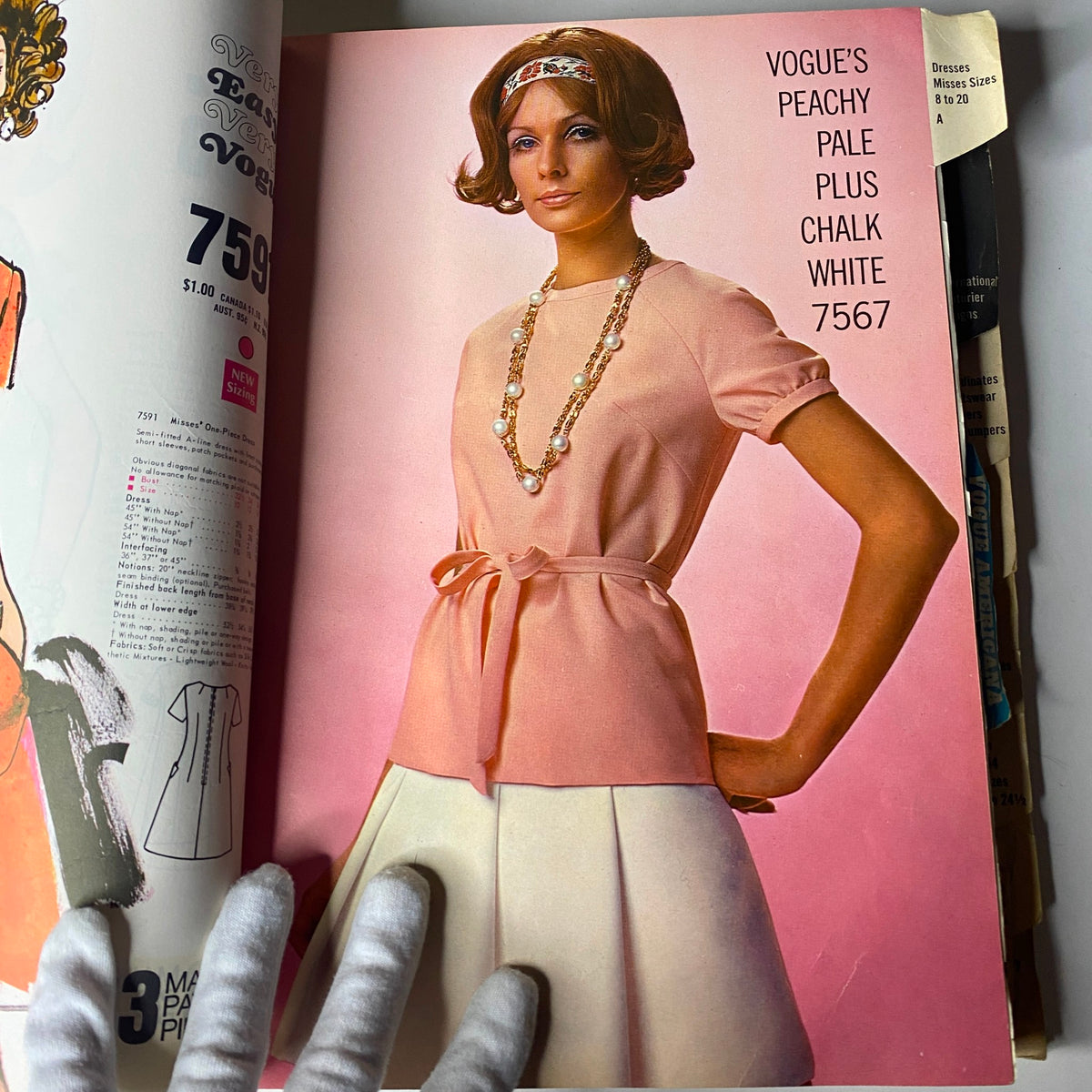 Detailed close-up of the 1969 Vogue Patterns July Catalog page displaying a model in a pink blouse and skirt combination, featuring vintage accessories and showcasing fashion trends from the 1960s.