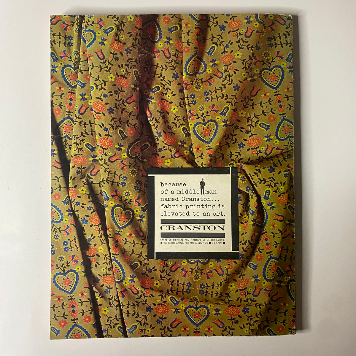 Cover page of the 1962 American Fabrics No. 56 Spring & Summer Catalog featuring vibrant textile designs and descriptions.