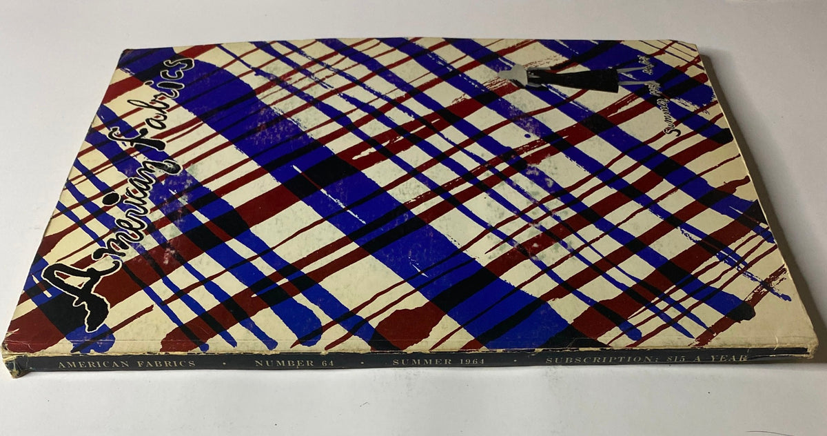 Spine view of the 1964 American Fabrics No. 64 Summer Catalog showcasing its vibrant plaid pattern and details, emphasizing the vintage textile design and industry insights within.