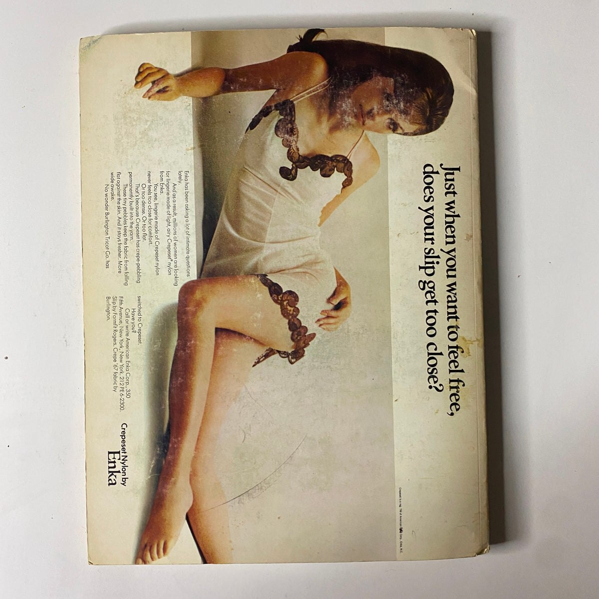 Back cover of the 1966 American Fabrics No. 73 Fall-Winter Catalog displaying a vintage fashion model in sleepwear, promoting Enka nylon fabrics.