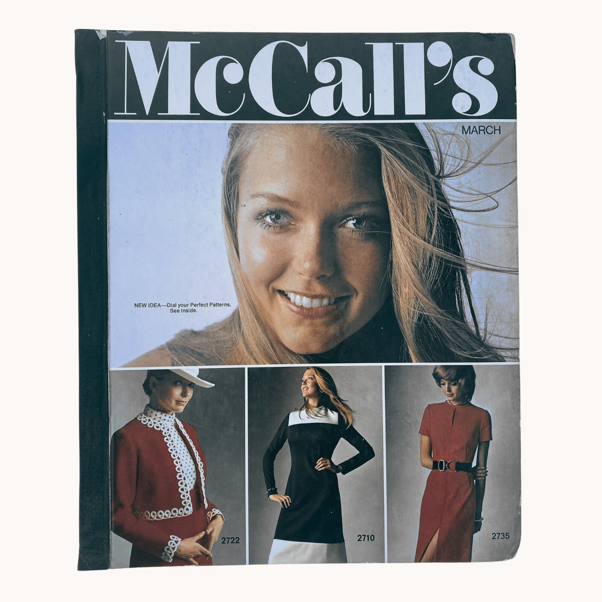 Cover of the 1971 March McCall's Catalog featuring a model smiling, showcasing seasonal fashion designs, including dresses and accessories. The cover highlights the vintage aesthetic of the early 1970s, ideal for sewing enthusiasts and collectors.