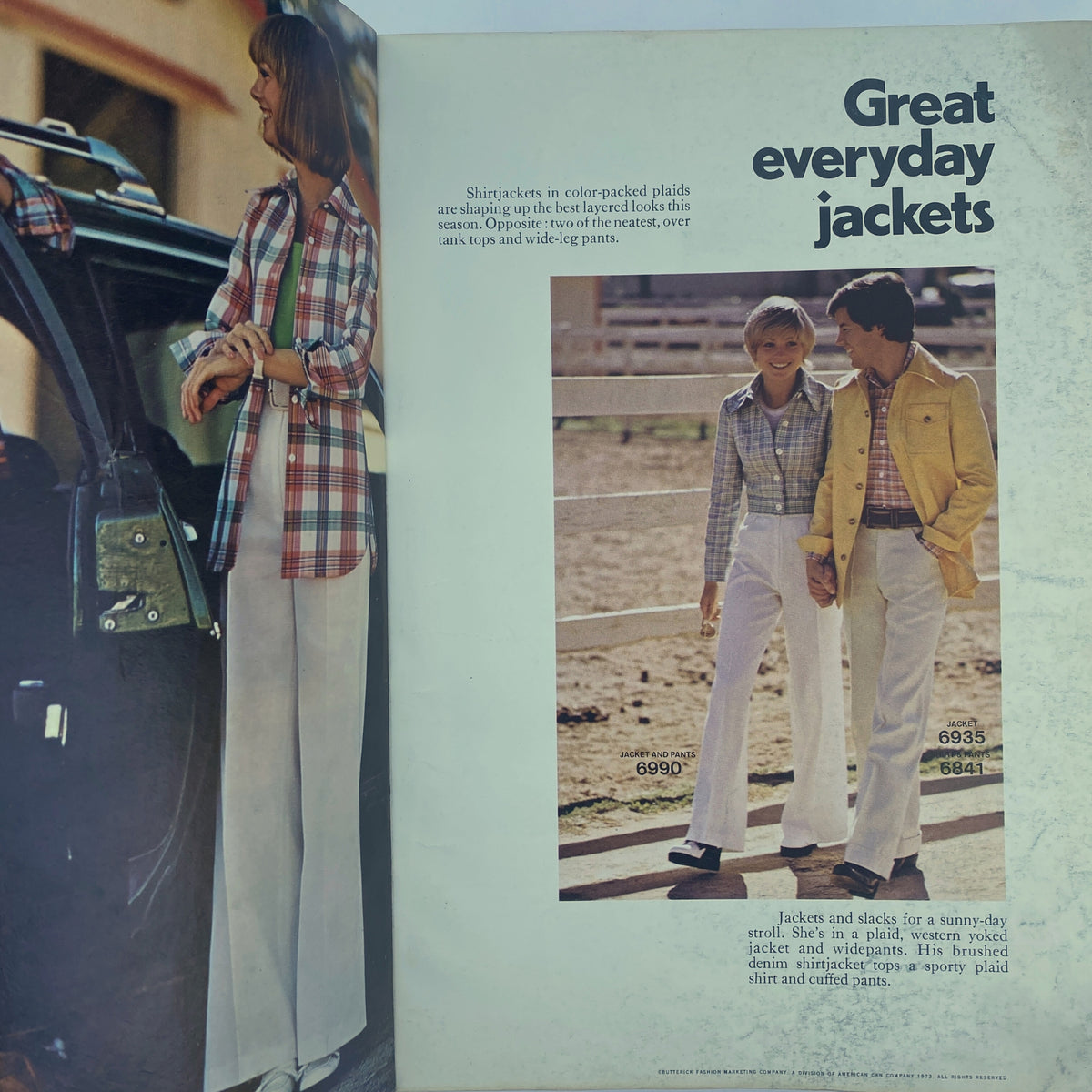 Interior spread of the 1973 May Butterick Catalog, displaying models in vintage fashion jackets and slacks, illustrating 1970s style.
