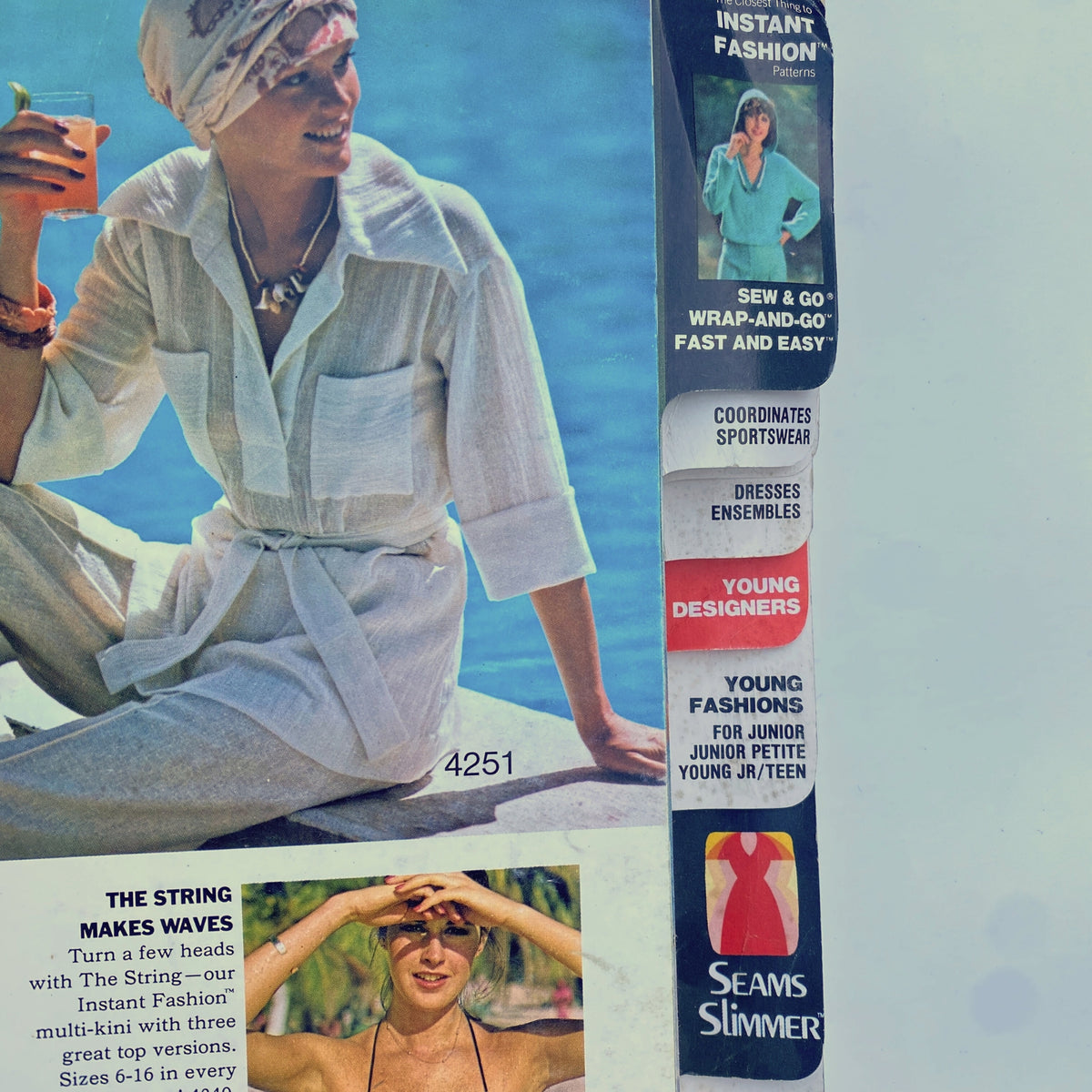 Close-up of the 1975 July Butterick Catalog showcasing models in stylish summer fashions, emphasizing the theme of instant fashion.