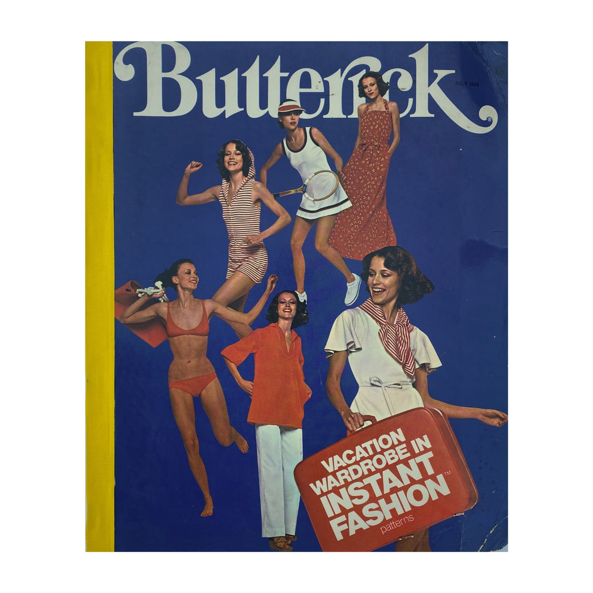 1975 July Butterick Summer Catalog cover featuring vibrant summer fashion patterns, showcasing diverse styles including swimsuits, dresses, and casual wear, all in a striking blue background with the text 'Vacation Wardrobe in Instant Fashion'.