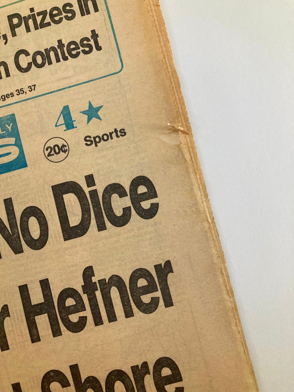 Close-up of the Philadelphia Daily News Tabloid dated April 8, 1982, highlighting the title 'It's No Dice For Hefner At Shore' and the tabloid's iconic vintage design.