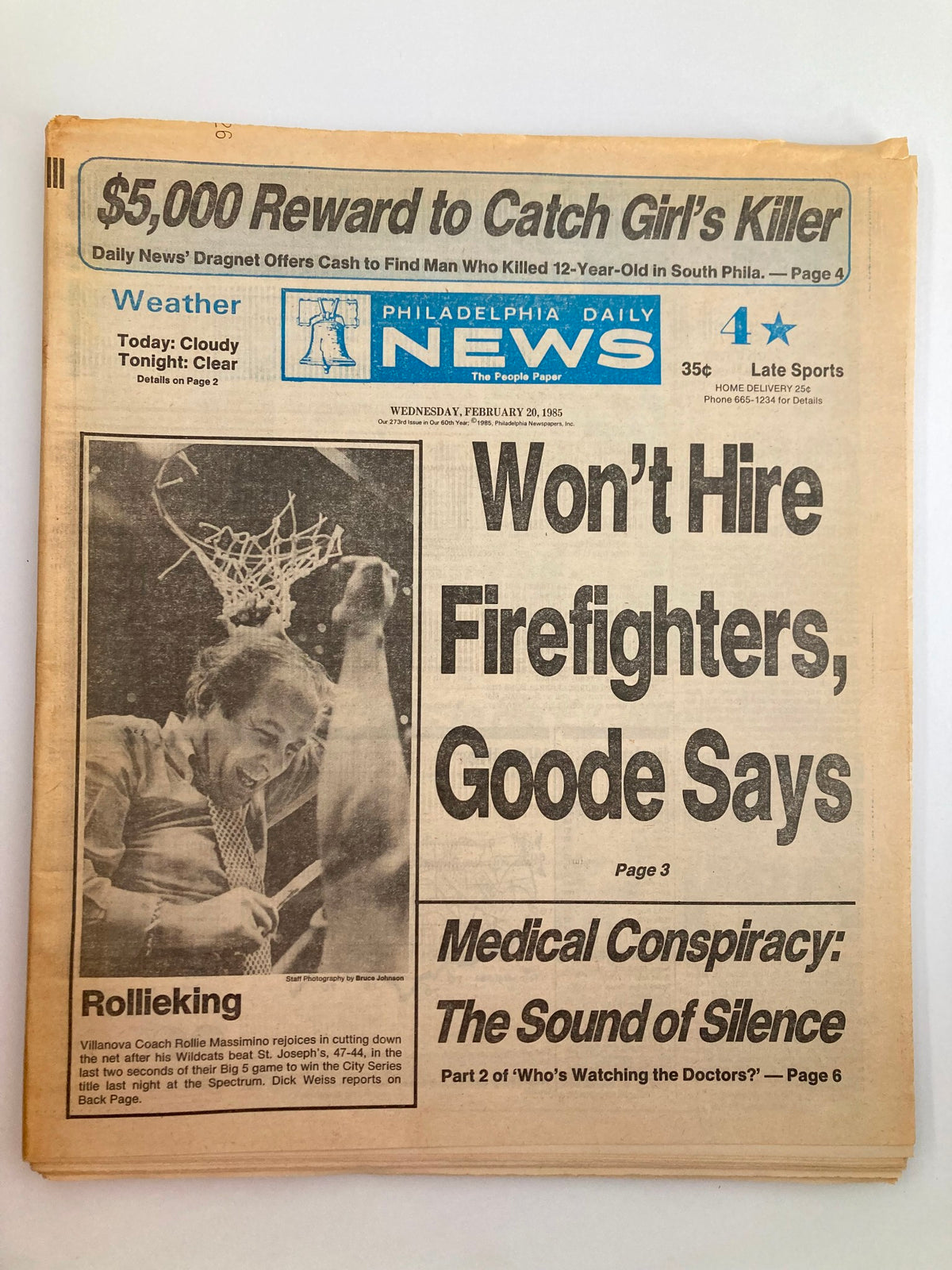 Philadelphia Daily News Tabloid February 20 1985 featuring coach Rollie Massimino celebrating after a victory with a basketball net in the background, newspaper headline discussing sports and local news.