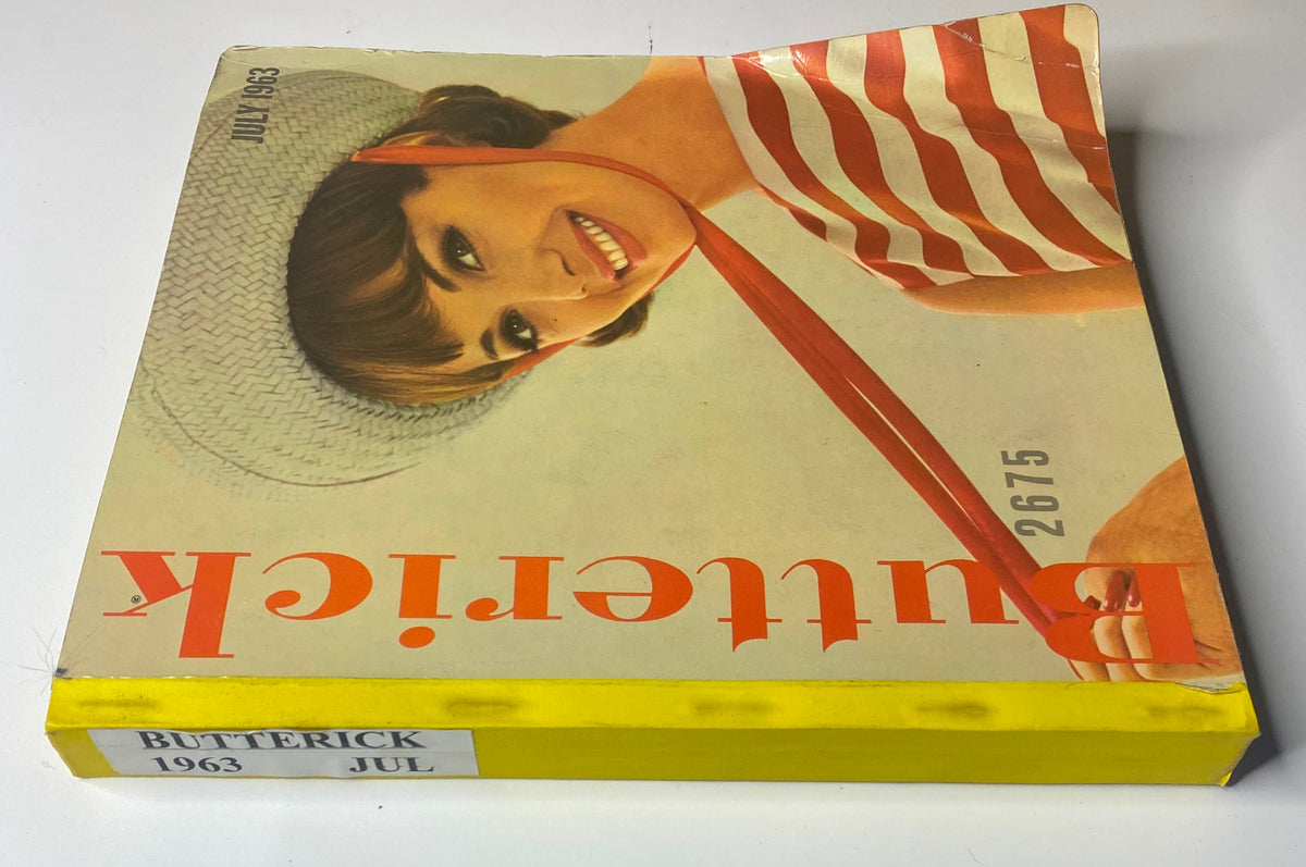 Cover of the 1963 Butterick June Catalog showcasing a stylish young woman in a striped dress, representing classic early 1960s fashion.