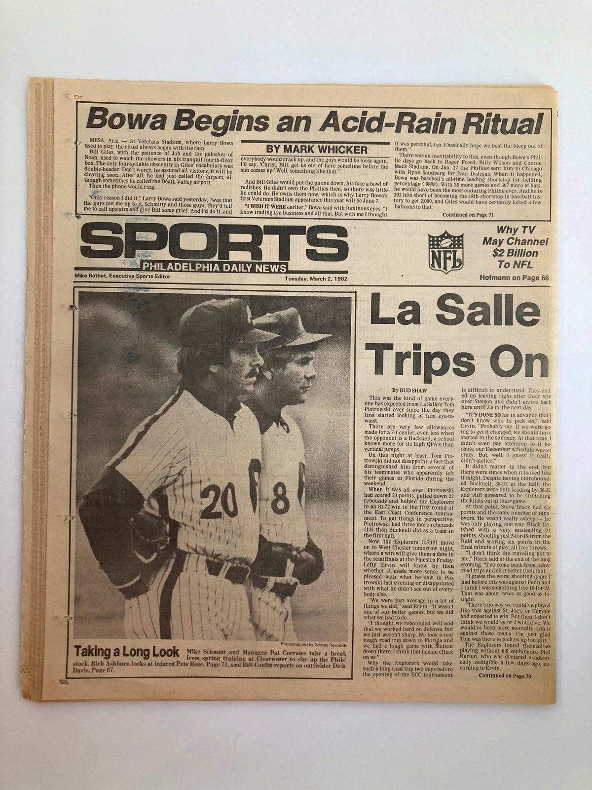Philadelphia Daily News Tabloid from March 2, 1982, showcasing the headline 'La Salle Trips On'. The image presents a photograph of two baseball players in their Philadelphia Phillies uniforms, alongside a column by Mark Whicker discussing NFL topics.