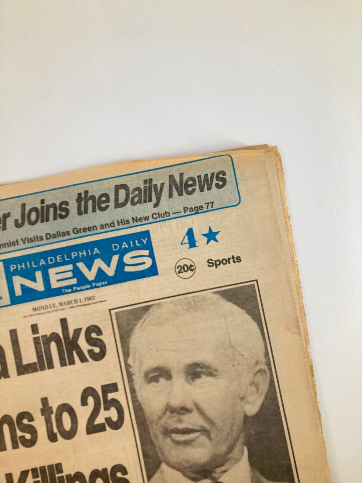 Close-up of the Philadelphia Daily News Tabloid March 1, 1982 showcasing the headline regarding Atlanta's killings and sports news.