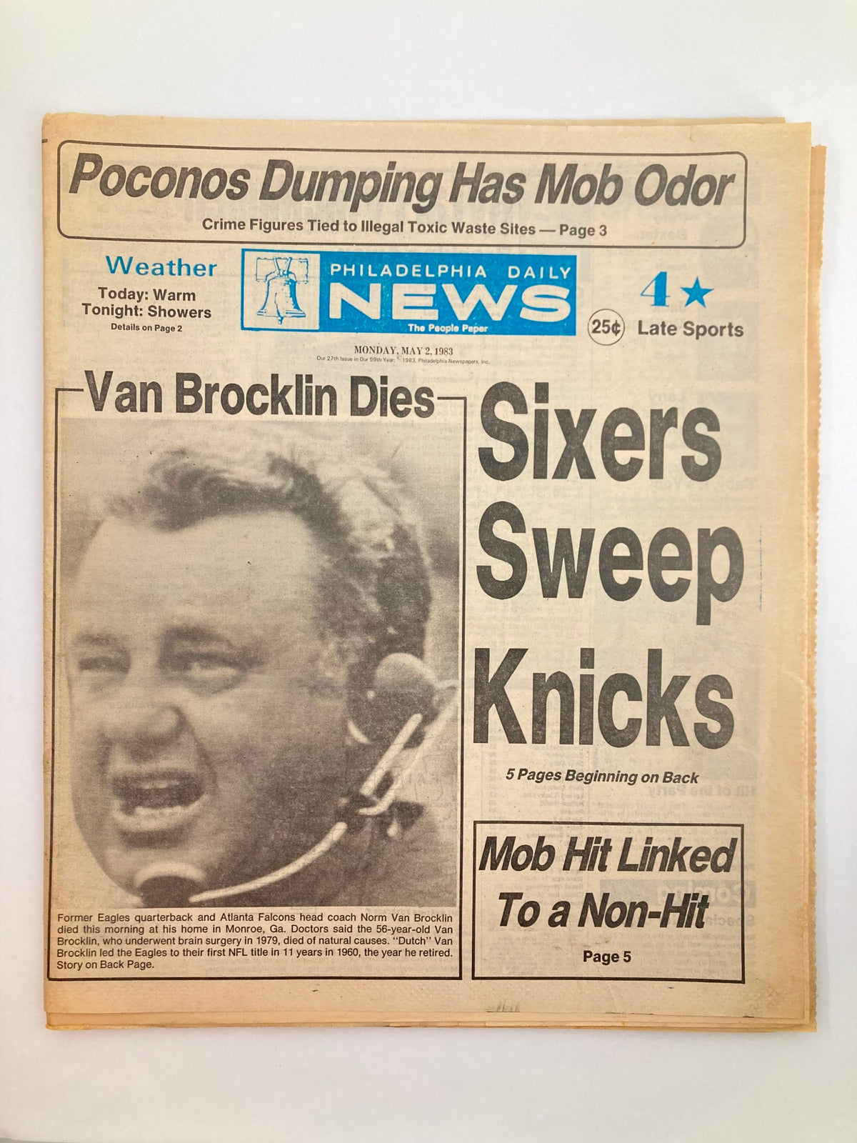 Philadelphia Daily News Tabloid from May 2, 1983, featuring the headline 'Van Brocklin Dies,' highlighting the passing of NFL legend Norm Van Brocklin. The newspaper shows news coverage of his impact on the game and includes sports updates.