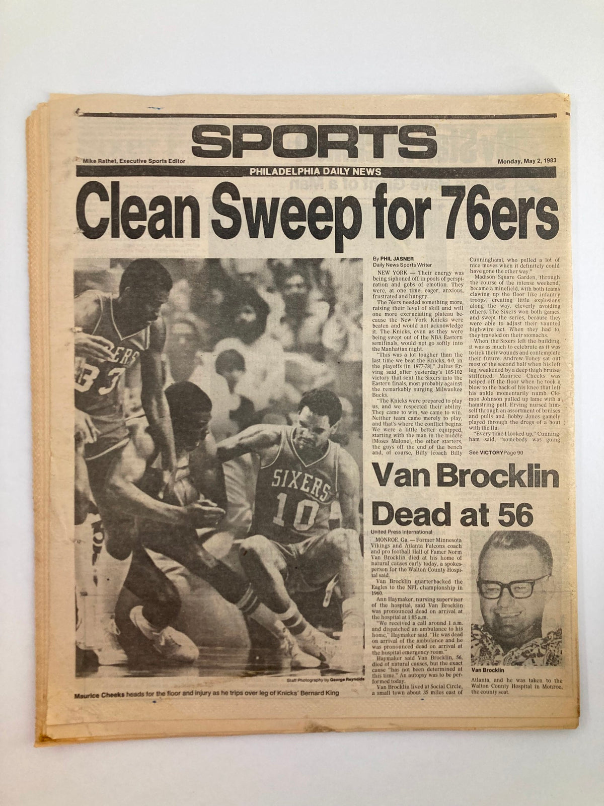 Philadelphia Daily News Tabloid from May 2, 1983, showcasing the article 'Clean Sweep for 76ers' alongside the news of 'Van Brocklin Dead at 56,' commemorating the legacy of NFL star Norm Van Brocklin amidst sports news of the era.