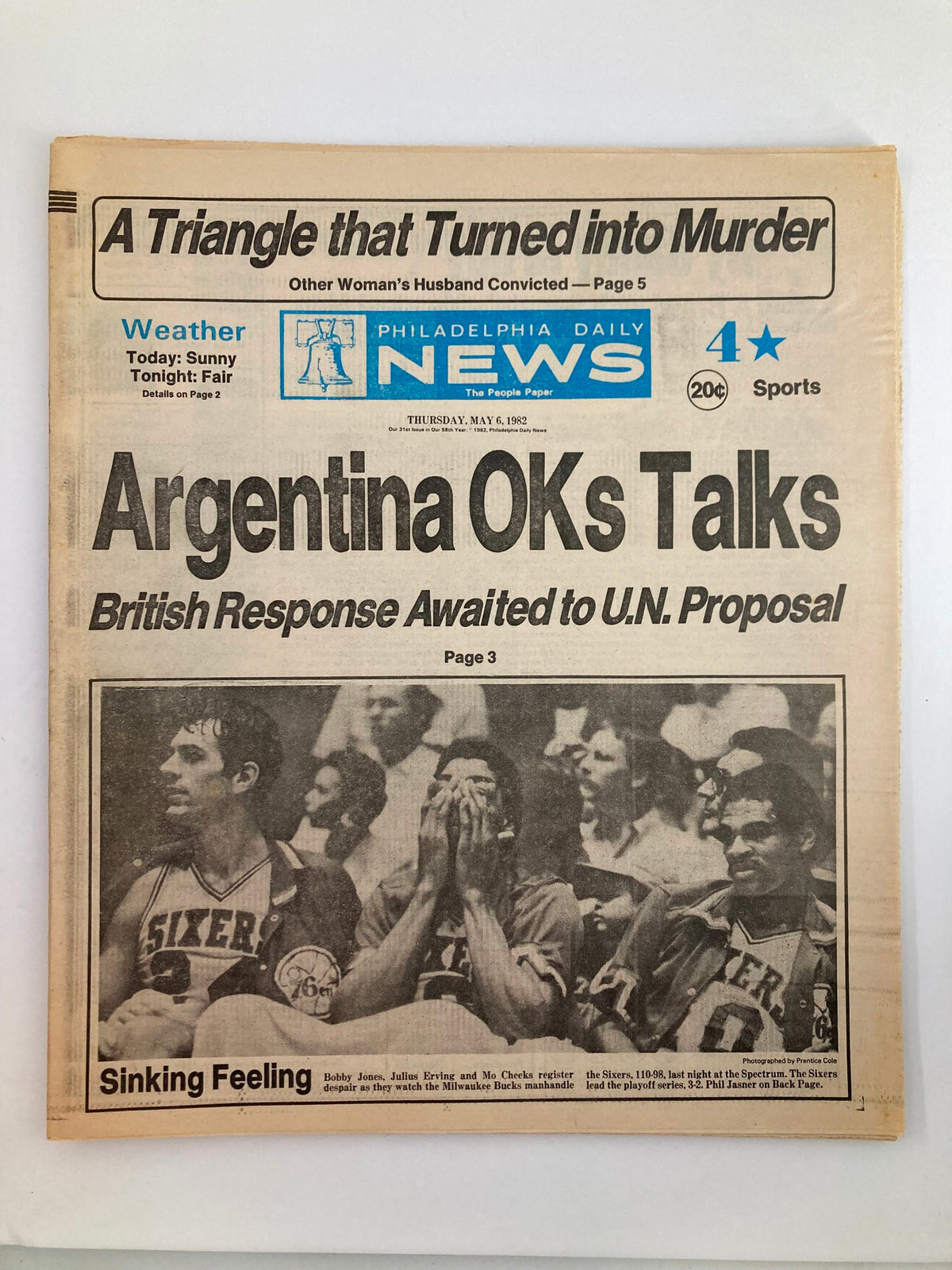 Philadelphia Daily News Tabloid from May 6, 1982, featuring NBA 76ers players Bobby Jones, Julius Erving, and Mo Cheeks. The cover highlights an article about the team's playoff performance, capturing a moment of despair as the players react to a tough game against the Milwaukee Bucks.