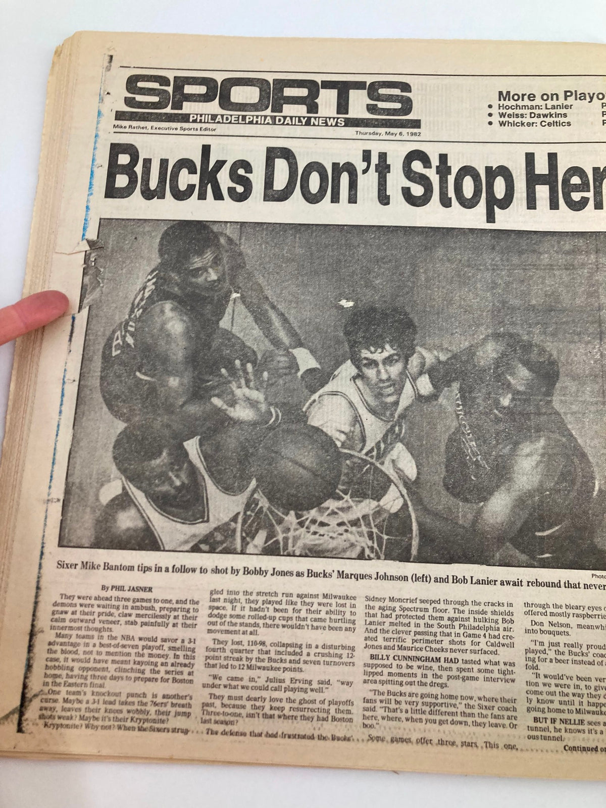 Philadelphia Daily News Tabloid from May 6, 1982 featuring NBA 76ers Bobby Jones, highlighting a moment during a basketball game with players attempting a shot and gaining a rebound. This vintage sports article captures the essence of the exciting NBA season in the early 1980s.