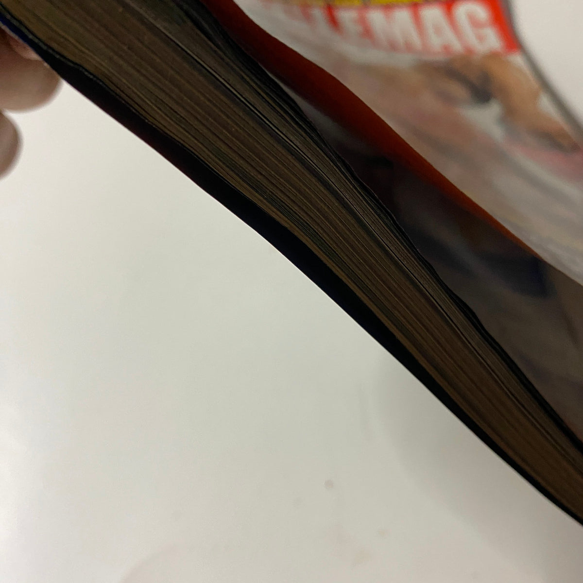 Side view of the MuscleMag International Magazine June 2007, displaying the thickness of the vintage publication.