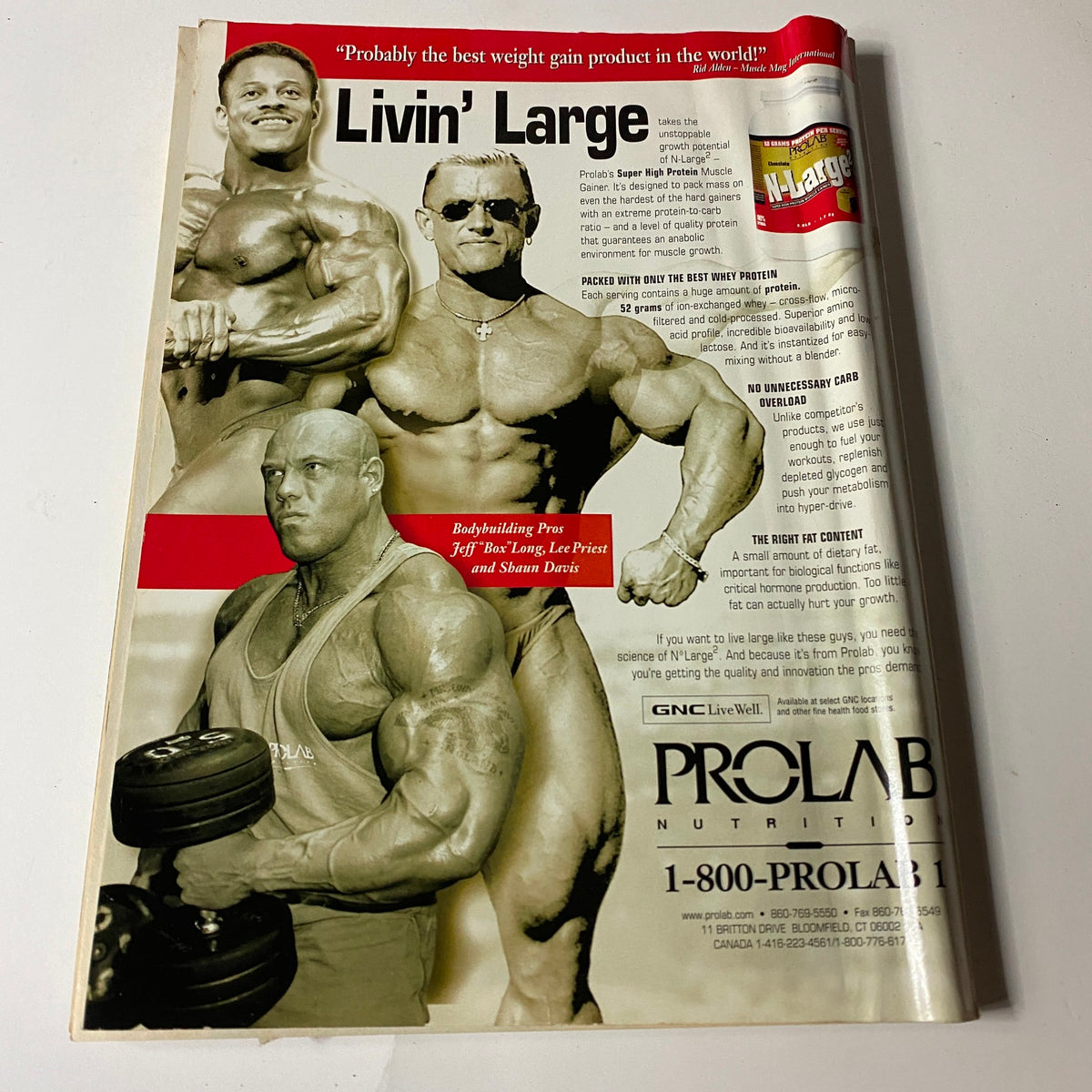 Interior page of MuscleMag Int'l Magazine April 2000 No. 214, highlighting bodybuilding advertisements and featured athletes.