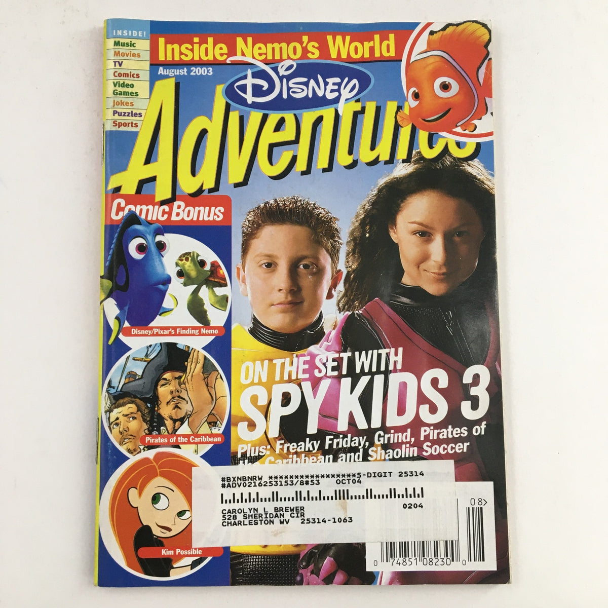 Cover of Disney Adventures Magazine August 2003 featuring Spy Kids 3, Finding Nemo, and Kim Possible. The magazine showcases colorful illustrations and highlights key characters from popular Disney films.