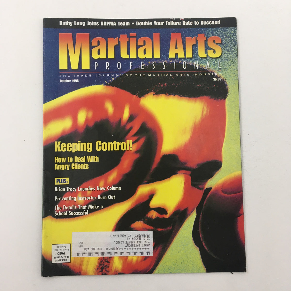 Cover of Martial Arts Professional Magazine October 1998 featuring Kathy Long, showcasing bold graphics and headlines about martial arts strategies and techniques.