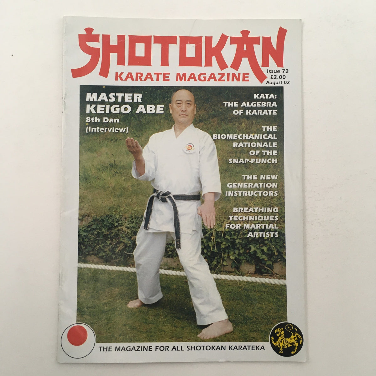 Cover of Shotokan Karate Magazine August 2002 Issue #72 featuring Master Keigo Abe 8th Dan, showcasing martial arts techniques and insights.