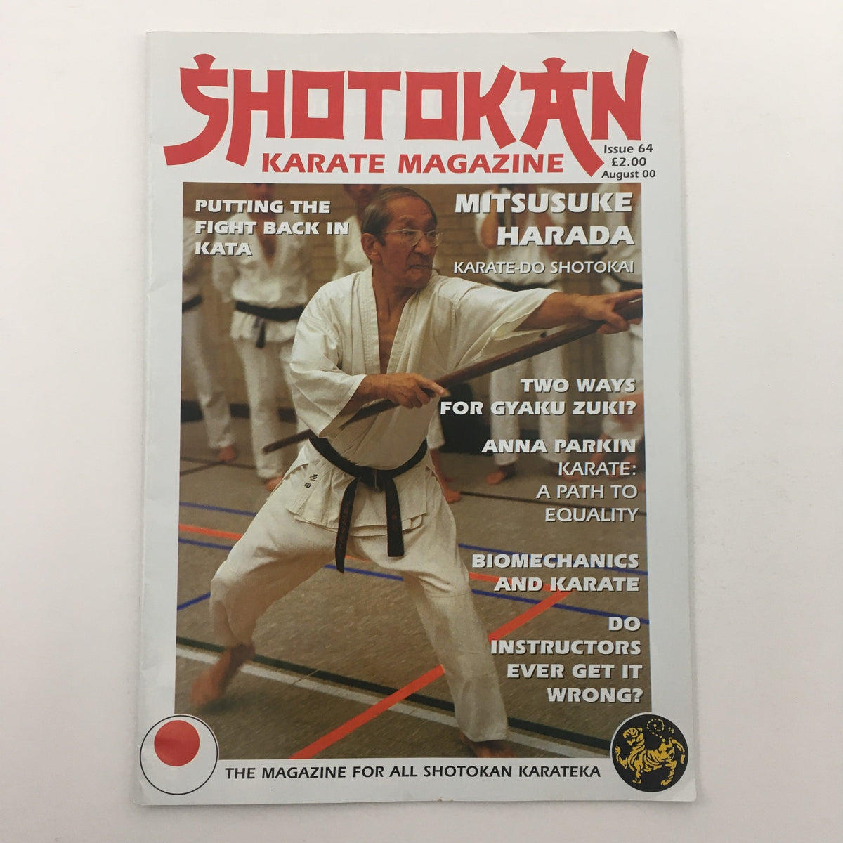 Shotokan Karate Magazine August 2000, Issue #64 featuring Master Mitsuze Harada demonstrating karate techniques on the cover, highlighting martial arts themes.