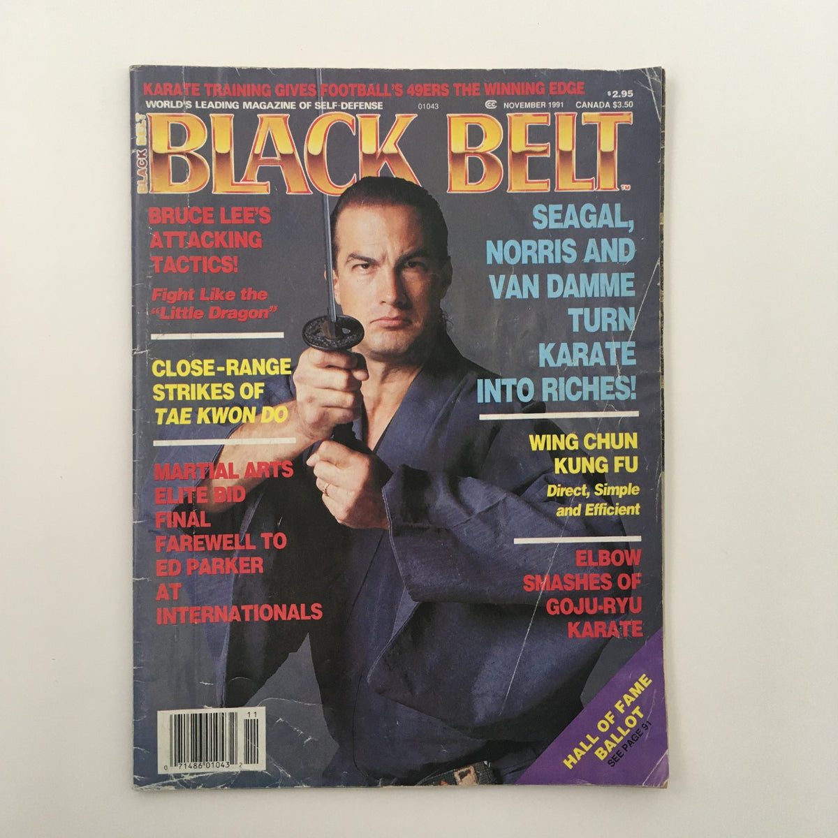 Cover of Black Belt Magazine, November 1991 featuring Steven Seagal with a sword, highlighting iconic martial artists including Chuck Norris and Jean-Claude Van Damme.