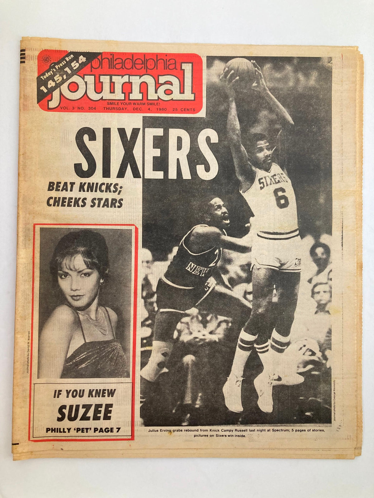 Philadelphia Journal Tabloid from December 4, 1980, Vol 3 #304 featuring NBA superstar Julius Erving. The cover discusses the Philadelphia 76ers game, highlighting their victory over the Knicks, and includes a photo of Erving in action, emphasizing the magazine's nostalgia for early 1980s basketball culture.