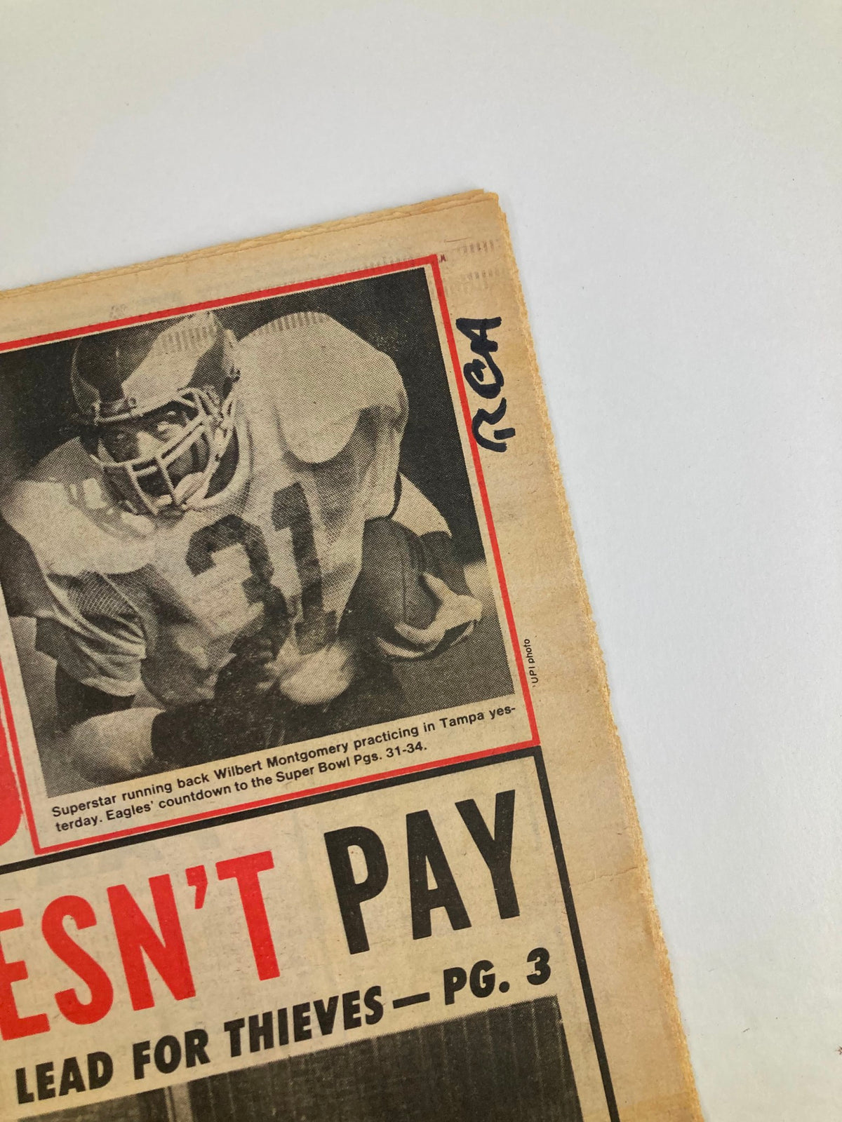 Close-up of the Philadelphia Journal Tabloid December 31, 1980, showcasing NFL standout Wilbert Montgomery practicing in Tampa. The image emphasizes the Eagles' countdown to the Super Bowl.