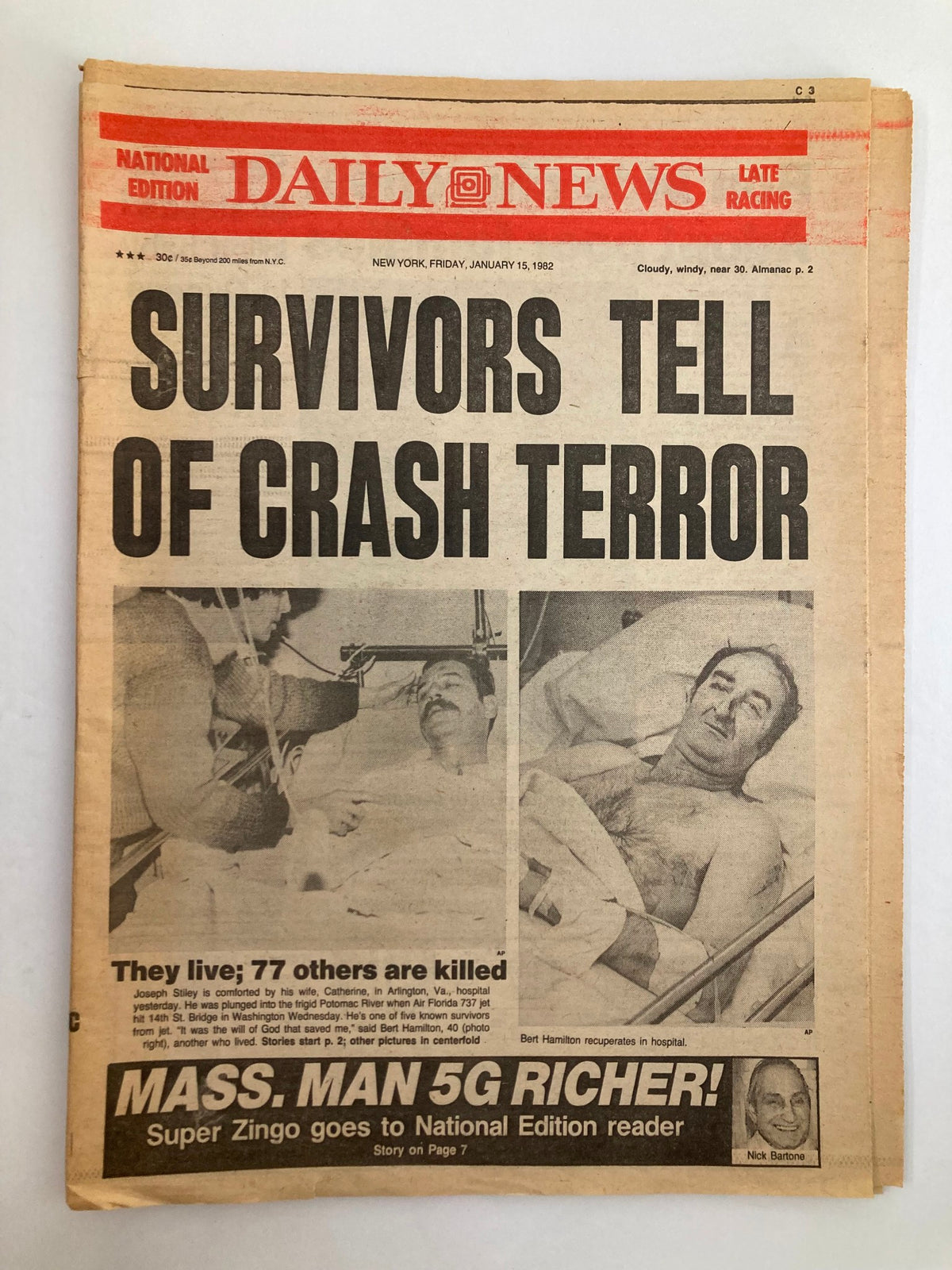 Daily News newspaper from January 15, 1982, featuring the headline 'Survivors Tell of Crash Terror' with a photo showing survivors in a hospital after a plane crash.