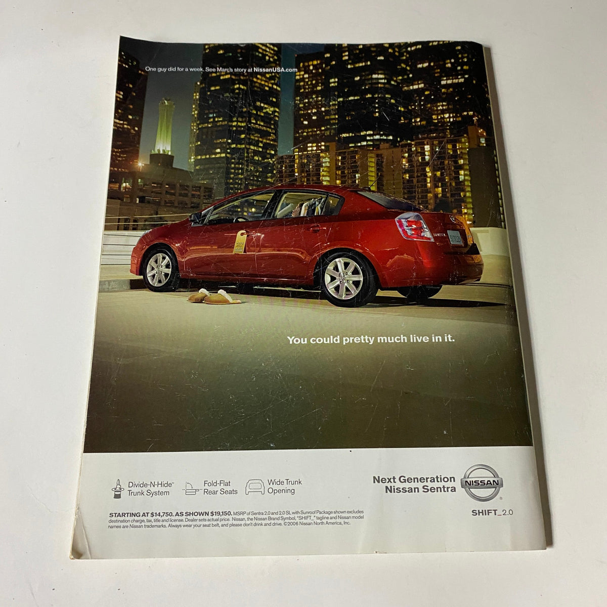 Back cover of Men's Fitness Magazine February 2007 showcasing an advertisement for the Next Generation Nissan Sentra against a city skyline.