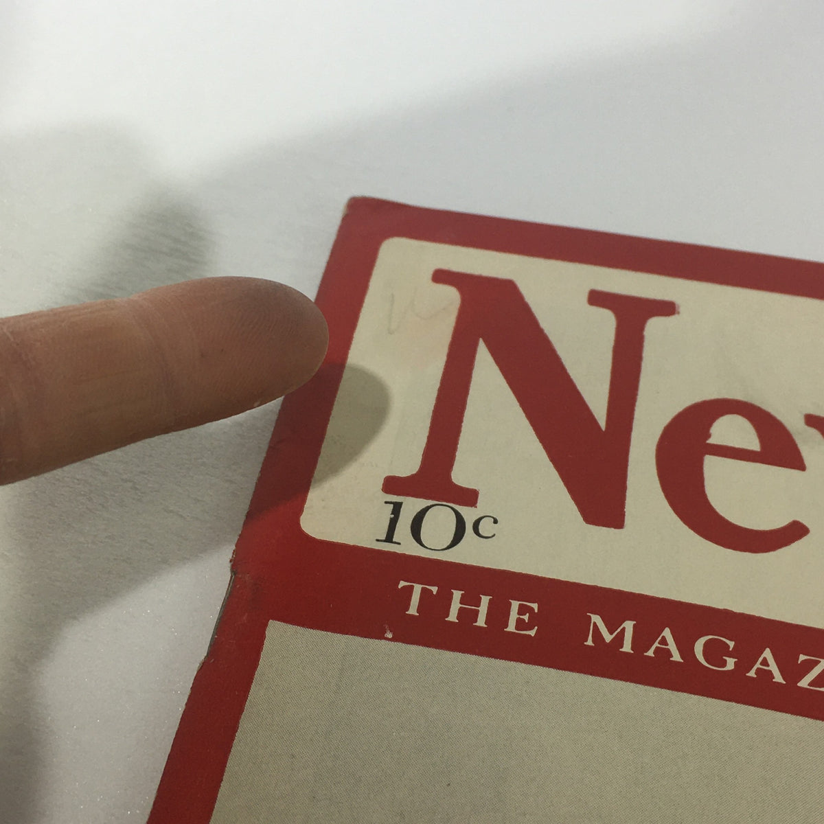 Close-up of the cover of the VTG Newsweek Magazine from September 18, 1939, showcasing the title 'Scourge Of 1914-18 Returns To The Sea' with a finger pointing at the magazine.