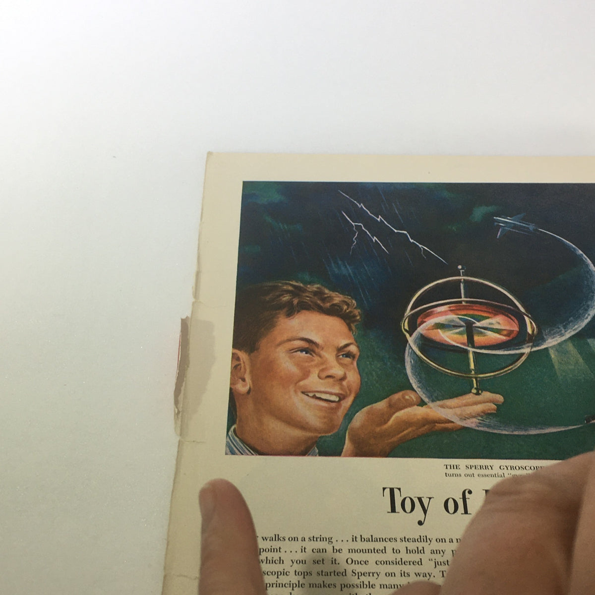 Interior page of Vintage Newsweek Magazine from January 21, 1946, depicting a young boy smiling with a toy gyroscope, complementing the nostalgic theme of the publication.
