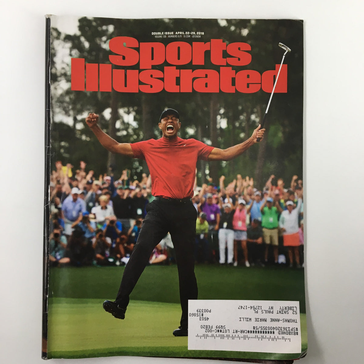 Cover of Sports Illustrated Magazine April 22-29 2019 featuring Tiger Woods celebrating a significant moment in golf history.