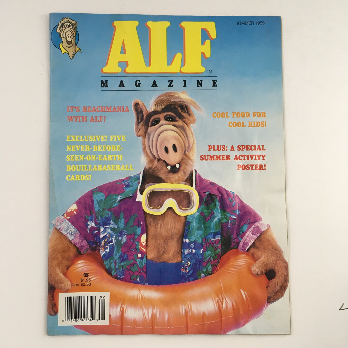 Cover of ALF Magazine Summer 1989 featuring the character ALF in a colorful beach outfit, adorned with a snorkel, with a playful tagline about exclusive Bouillabaseball cards. Perfect for collectors of vintage magazines.