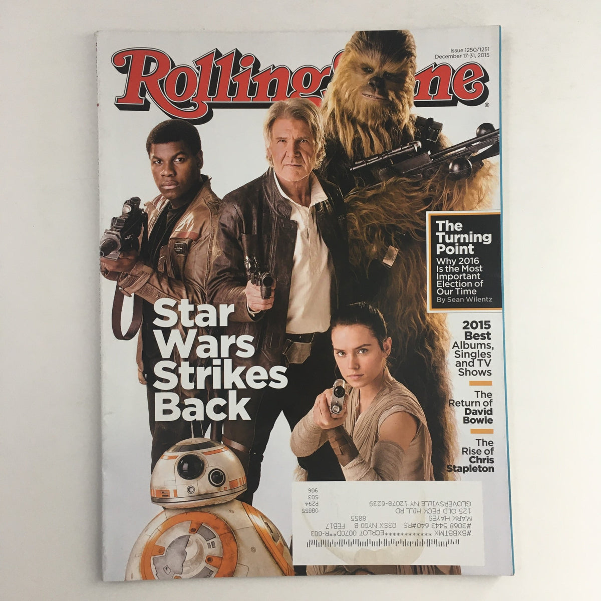 Rolling Stone Magazine December 17 2015 featuring Daisy Ridley, John Boyega, Harrison Ford, and Chewbacca on the cover, showcasing the 'Star Wars strikes Back' theme with characters and droid BB-8.