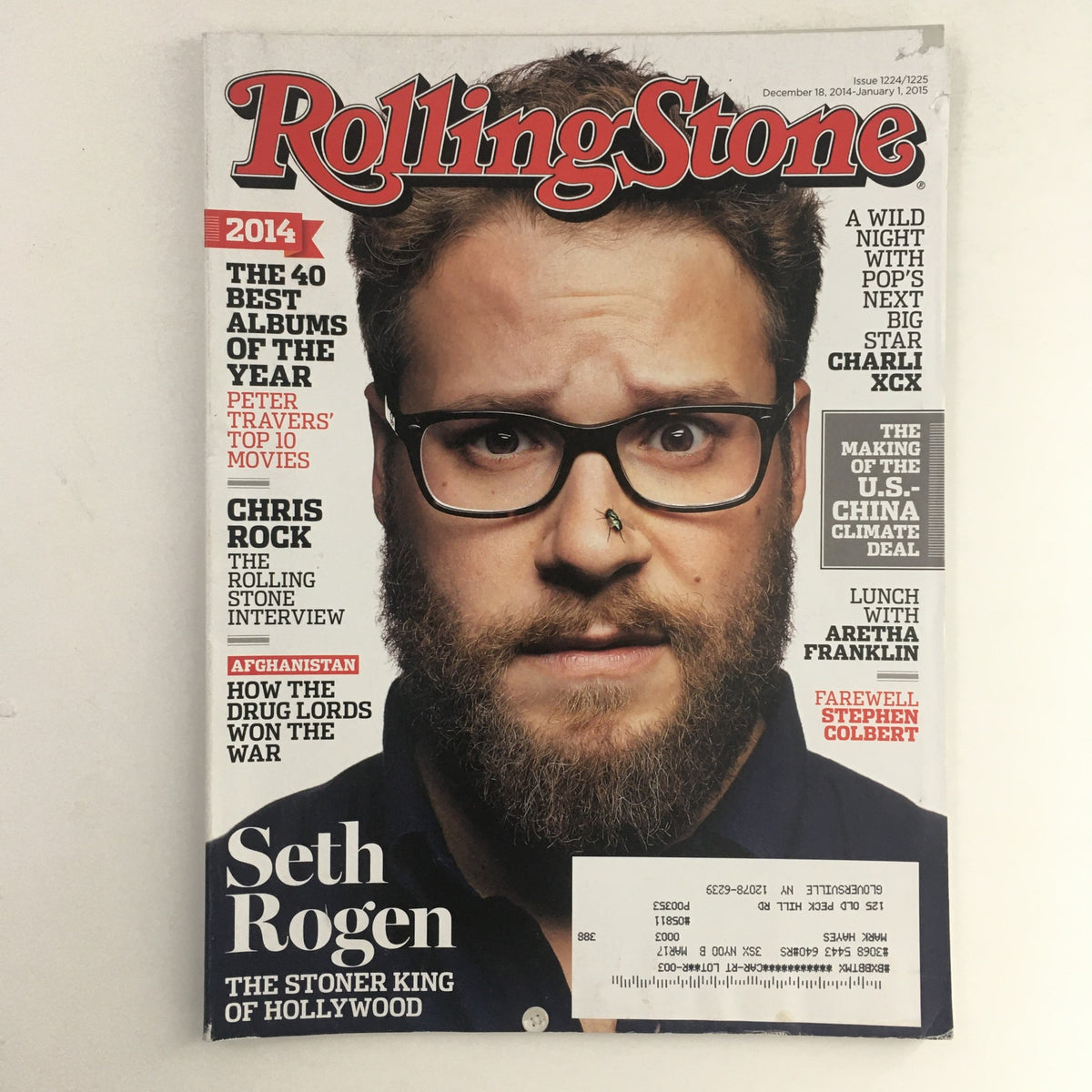 Rolling Stone Magazine December 18 2014 cover featuring Seth Rogen, Chris Rock, and Aretha Franklin. The issue highlights Seth Rogen as 'The Stoner King of Hollywood' with his photo prominently displayed, capturing iconic moments from comedy and music.
