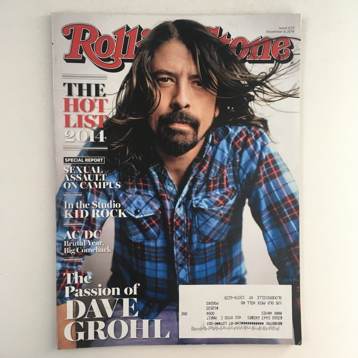 Rolling Stone Magazine December 4 2014 featuring Dave Grohl on the cover, highlighting 'The Passion of Dave Grohl', with additional features on AC/DC and Kid Rock. The magazine captures significant moments in music culture from 2014.