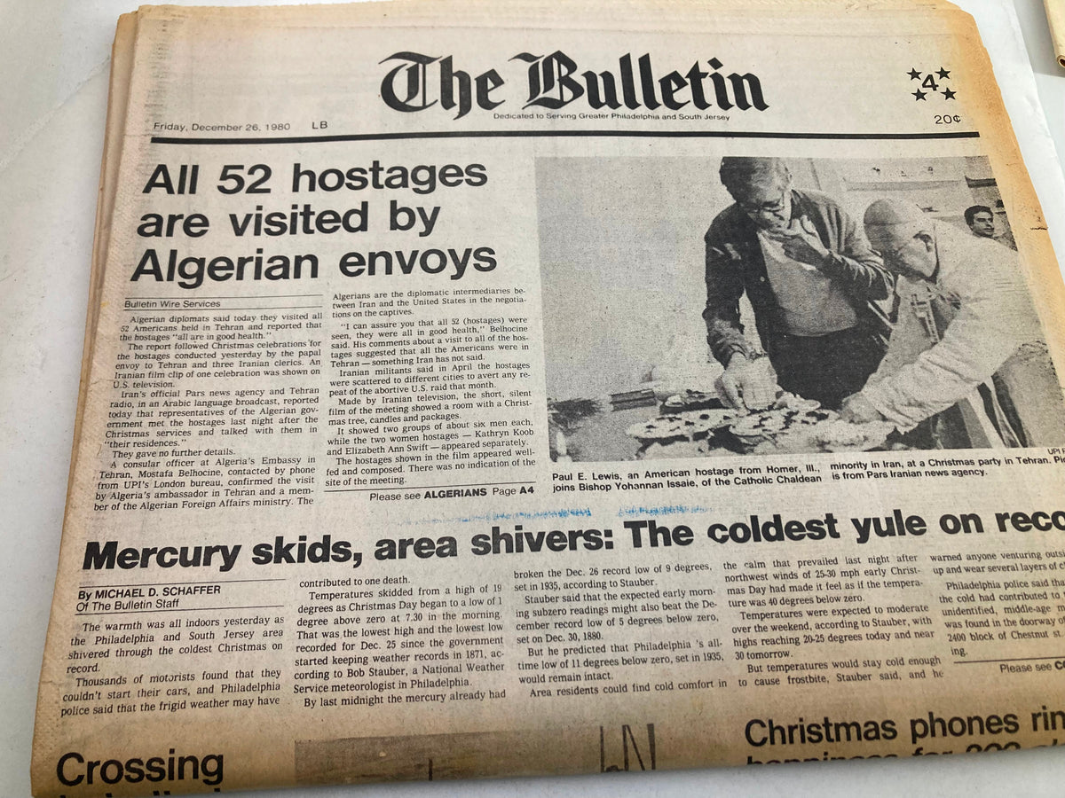 Front view of The Bulletin Newspaper, December 26, 1980, highlighting the headline 'Mercury Skids Area Shivers Coldest Yule'. The news captures historical events, including a Christmas party in Iran, cold weather conditions, and social updates.