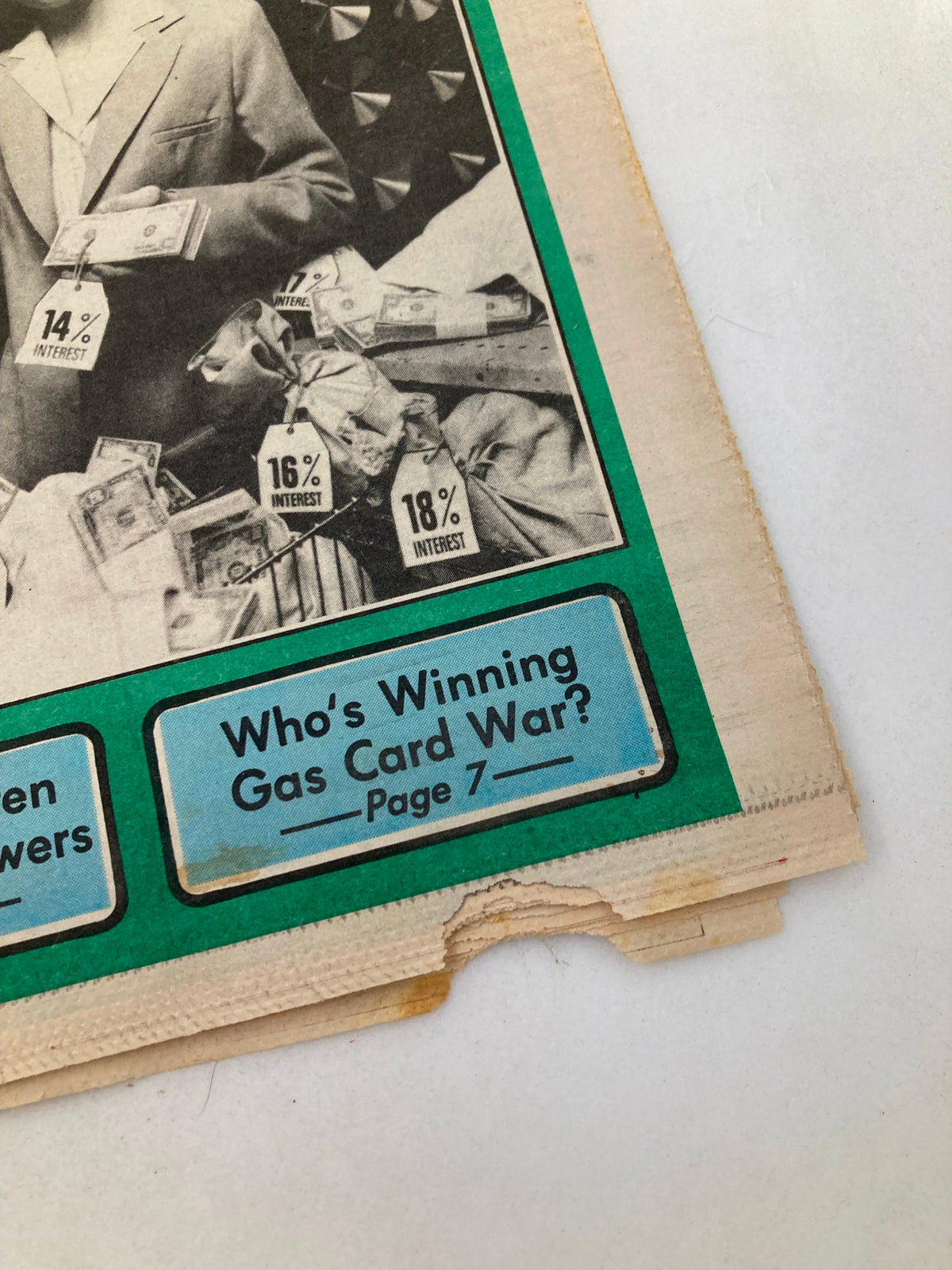 Close-up of Pennsylvania Economy Tabloid November 1982 Vol 3 #2, showcasing the section Who's Winning Gas Card War? with images of cash and interest rates.