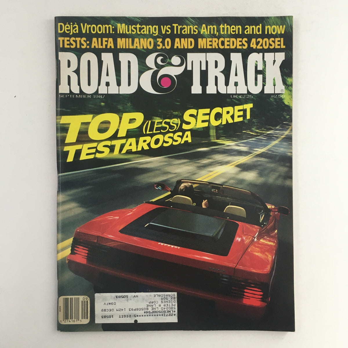 Cover of Road & Track Magazine September 1987 featuring Alfa Milano 3.0 and Mercedes 420SEL, showcasing a red Ferrari Testarossa convertible on a scenic road with bold text highlighting the magazine's content.