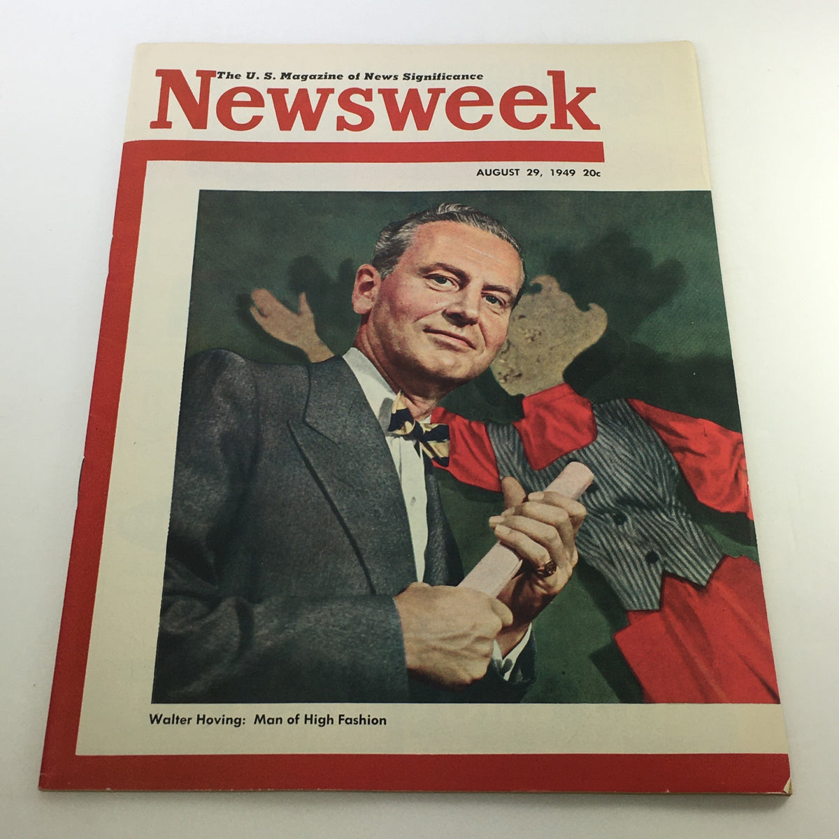 Cover of VTG Newsweek Magazine from August 29, 1949, featuring Walter Hoving with a bow tie, alongside a clown figure, showcasing the magazine's theme of 'Man of High Fashion'.
