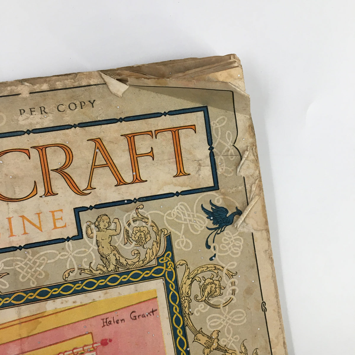 Close-up of the title on the VTG Needlecraft Magazine, March 1927, highlighting the intricate design elements and vintage aesthetic of the publication.