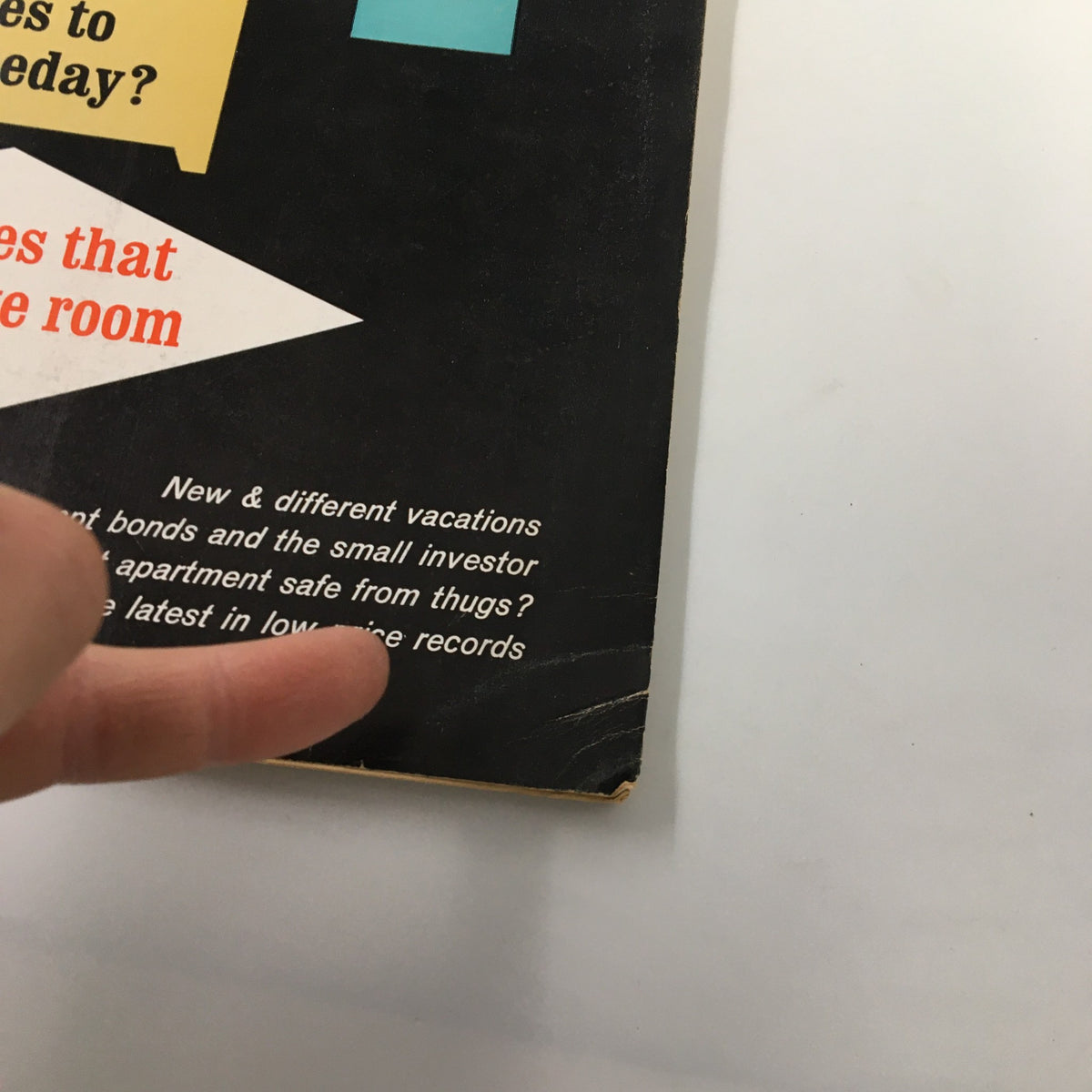 Close-up view of the back cover of VTG Changing Times Magazine May 1966 showing minor wear and topics covered within the issue.