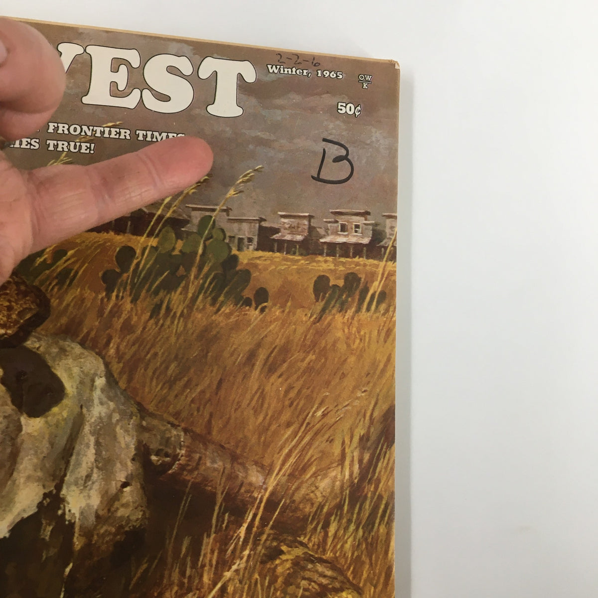 Close-up of the cover of VTG Old West Magazine Winter 1965, showing the title and a hand pointing at the 'Book Bonus!' section, emphasizing collectible information related to Fort Scott.
