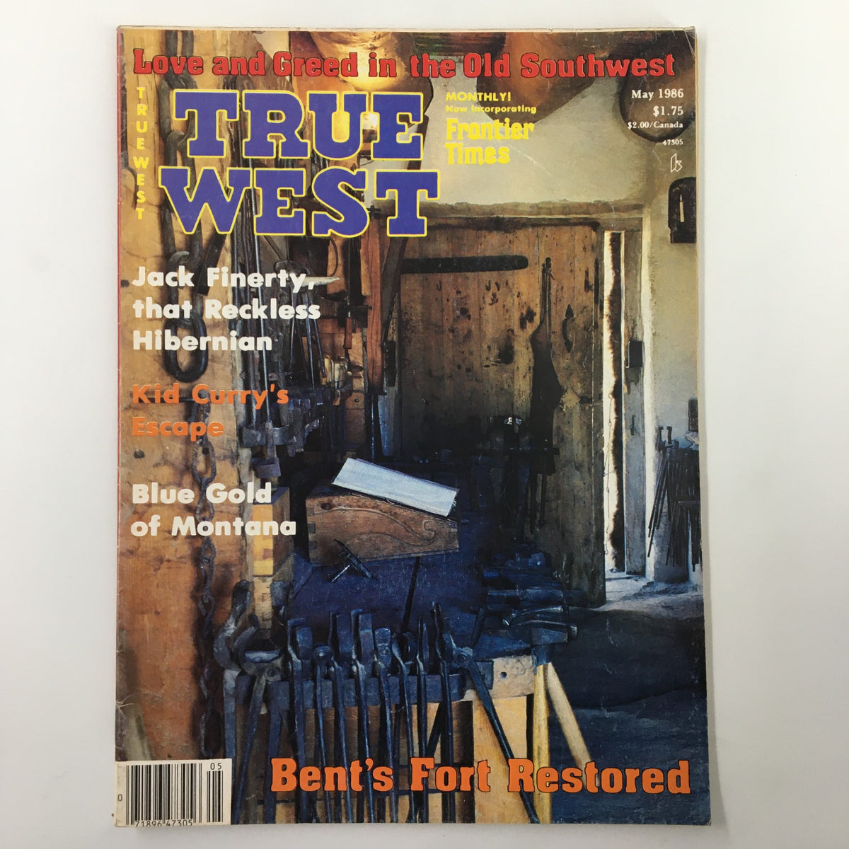 Cover of VTG True West Magazine May 1986 Vol 33 #5 featuring the theme 'Love and Greed in the Old Southwest' and showcasing a blacksmith's shop interior.
