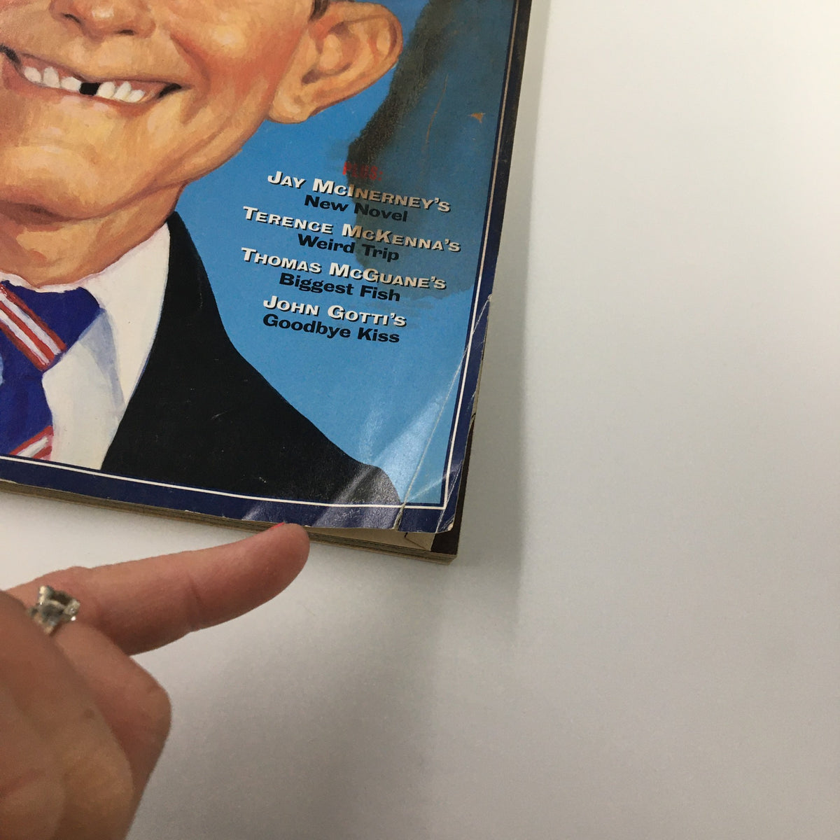 Close-up view of the Esquire Magazine June 1992 cover highlighting the smiling George Bush illustration along with article titles such as 'Jay McInerney's New Novel' and 'Thomas McGuane's Biggest Fish'.